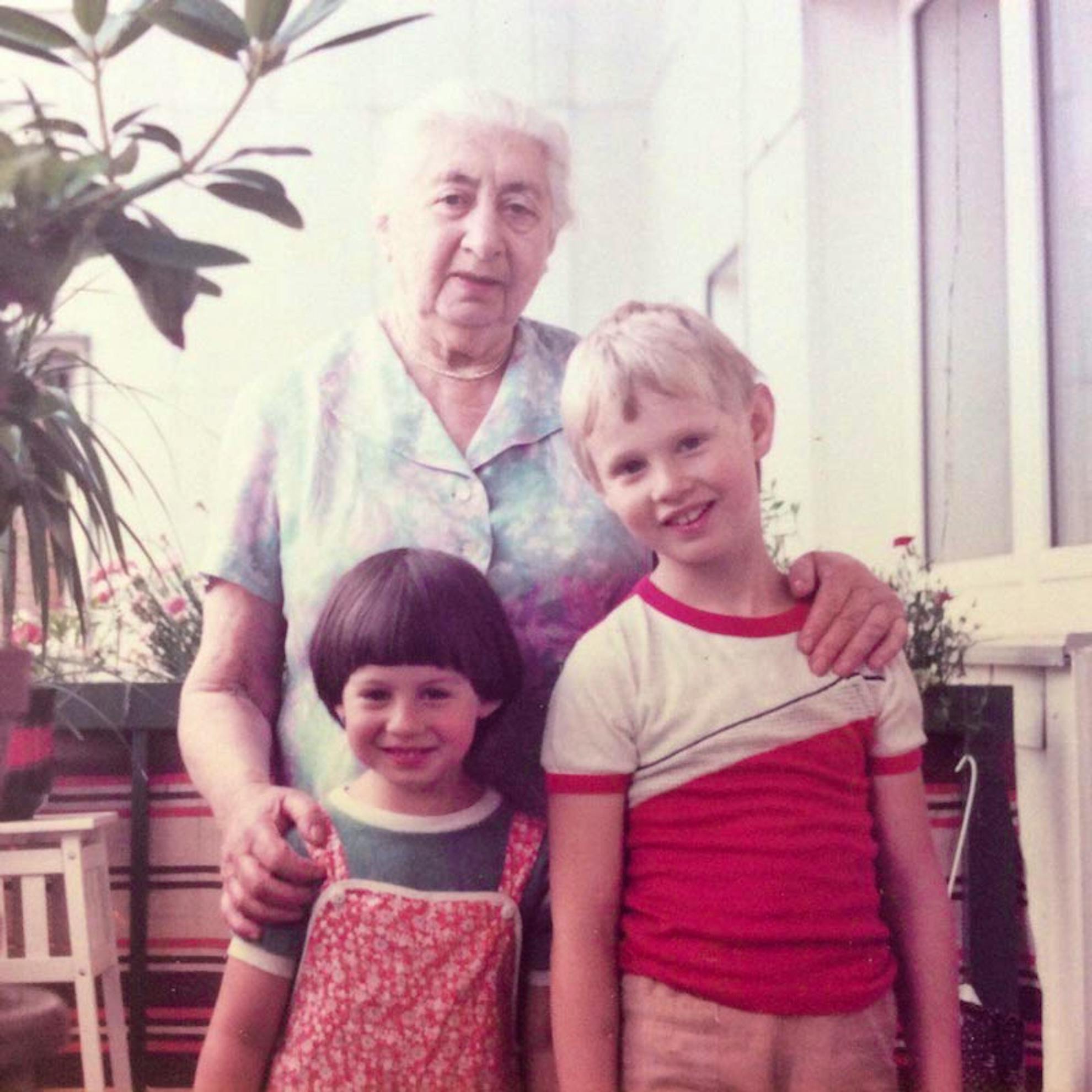 Adel with her grandmother and brother