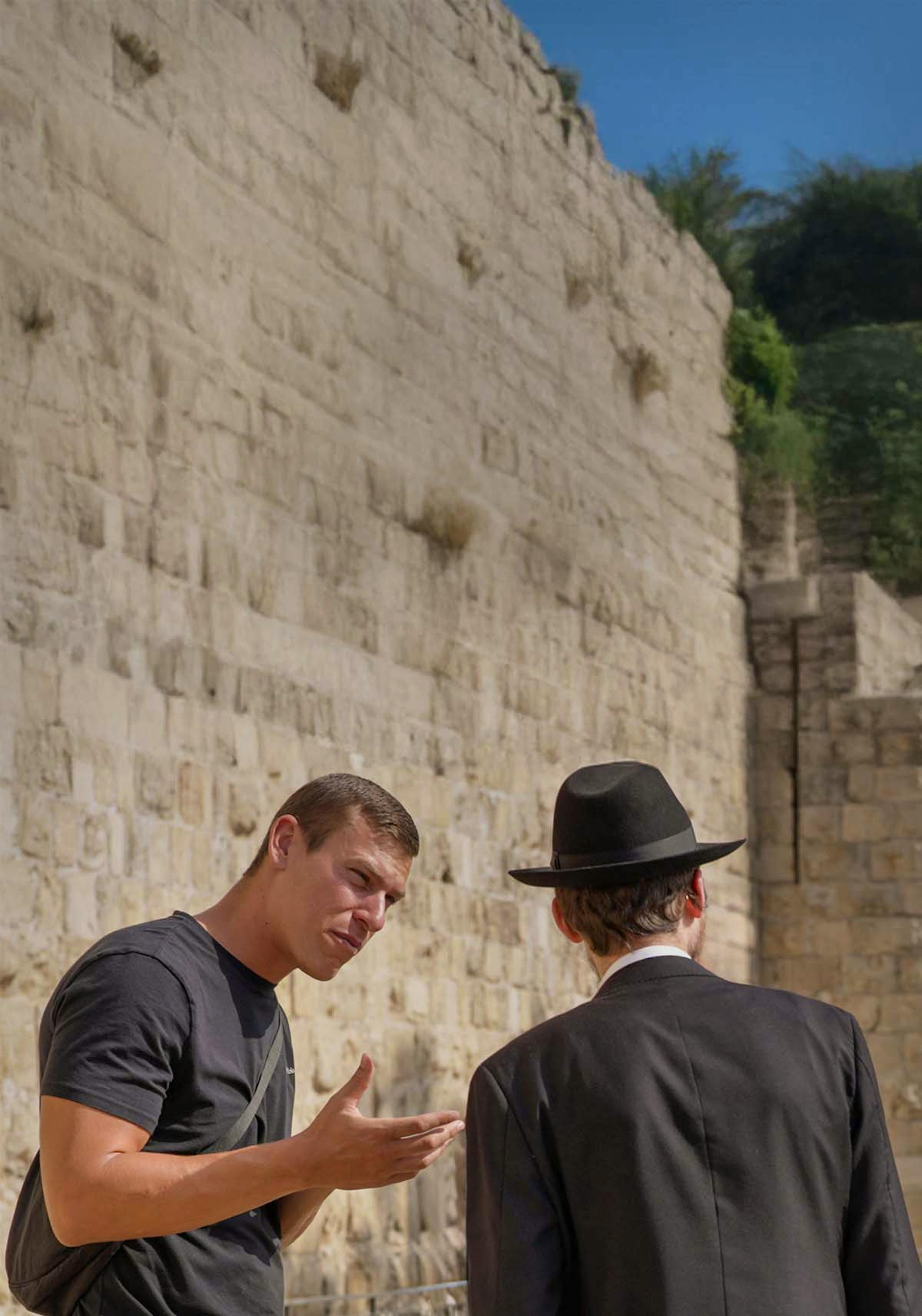 Jewish men having conversation on the street