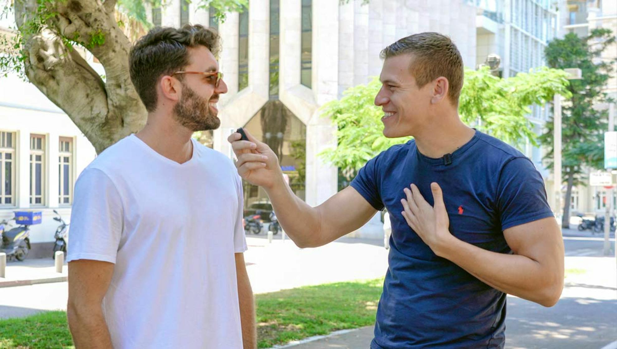 Elisha Lazarus (right) interviewing an Israeli in Tel Aviv for SO BE IT!