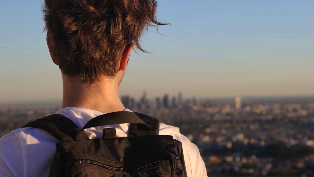 Man looking out over Los Angeles