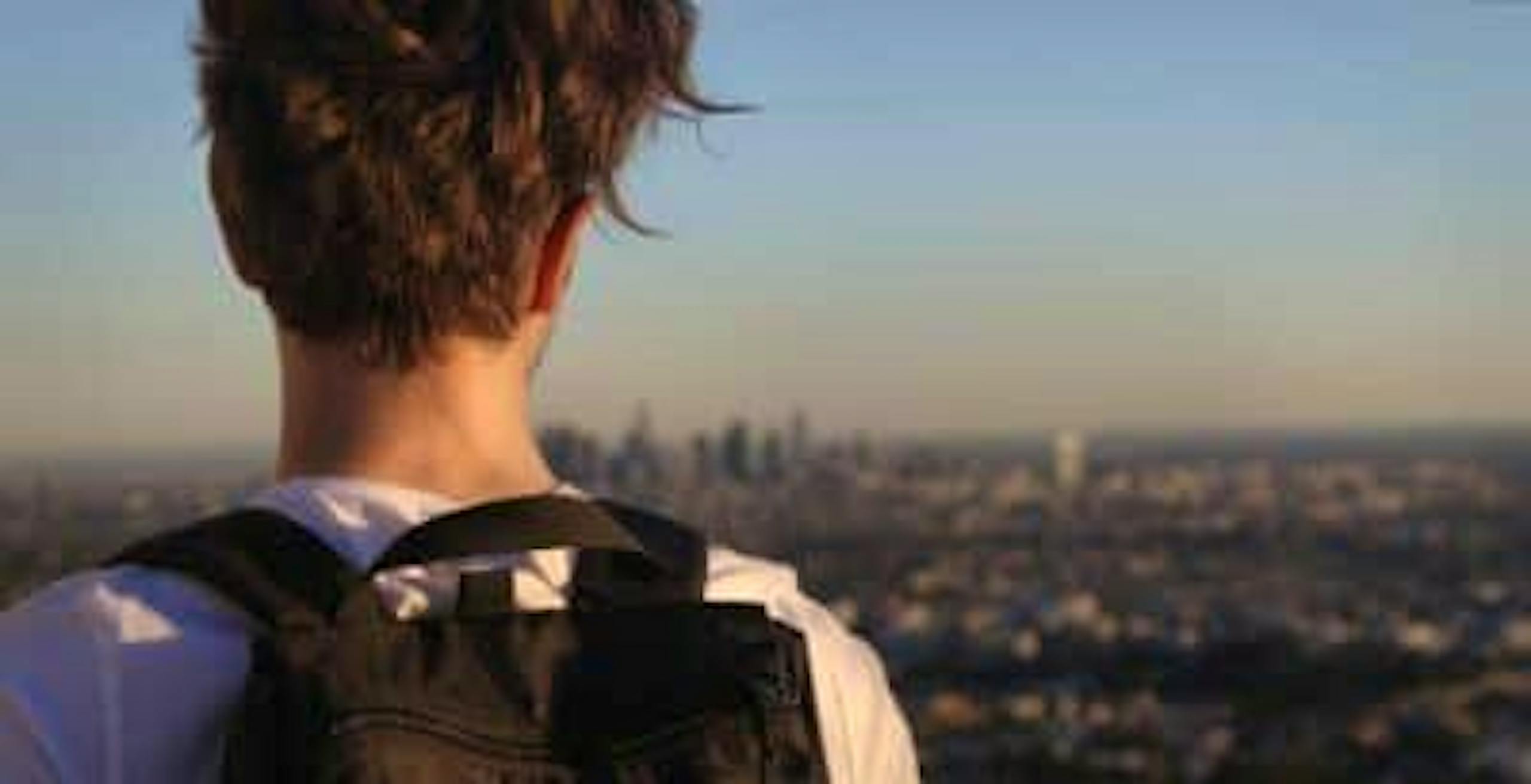 Man looking out over Los Angeles