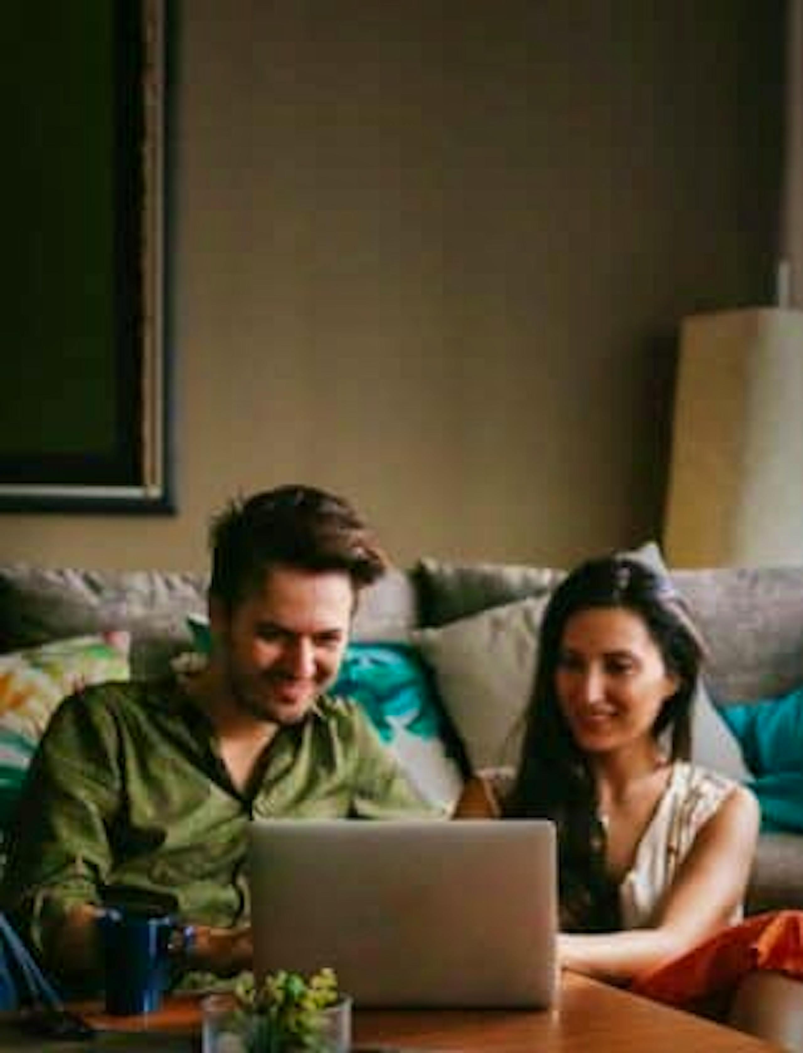 Couple studying Jewish Evangelism in their living room.