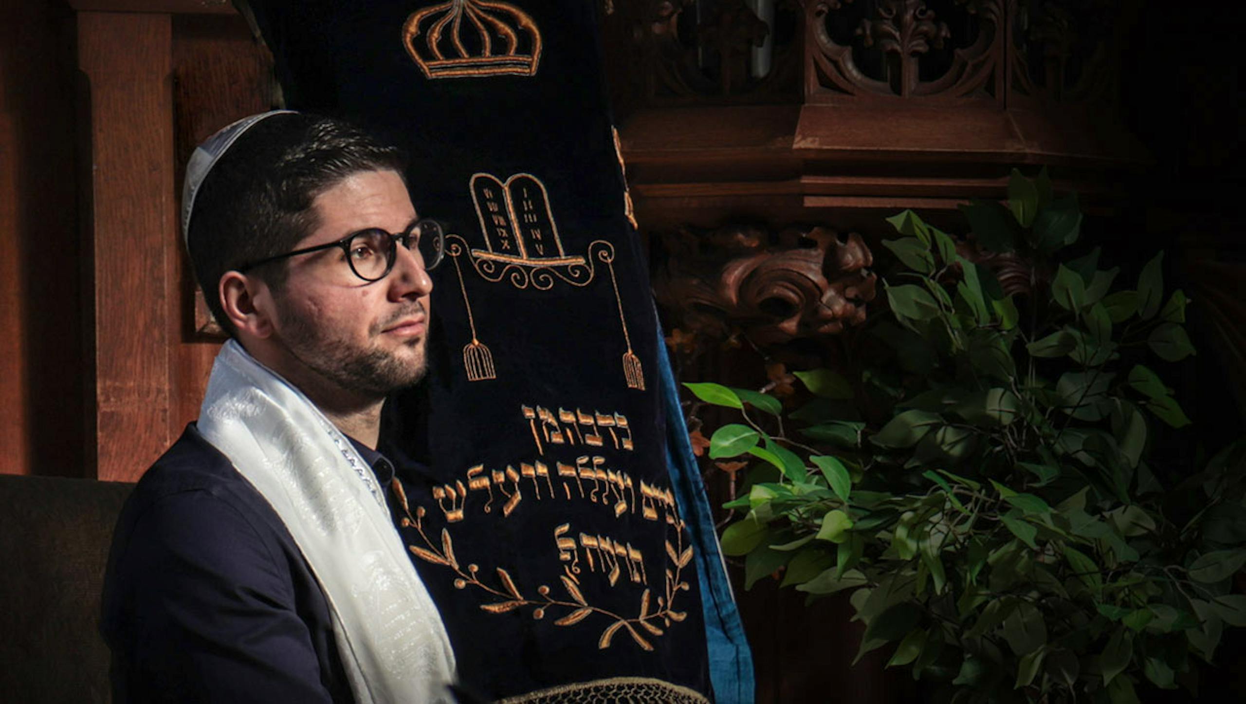 Jewish man in synagogue service.