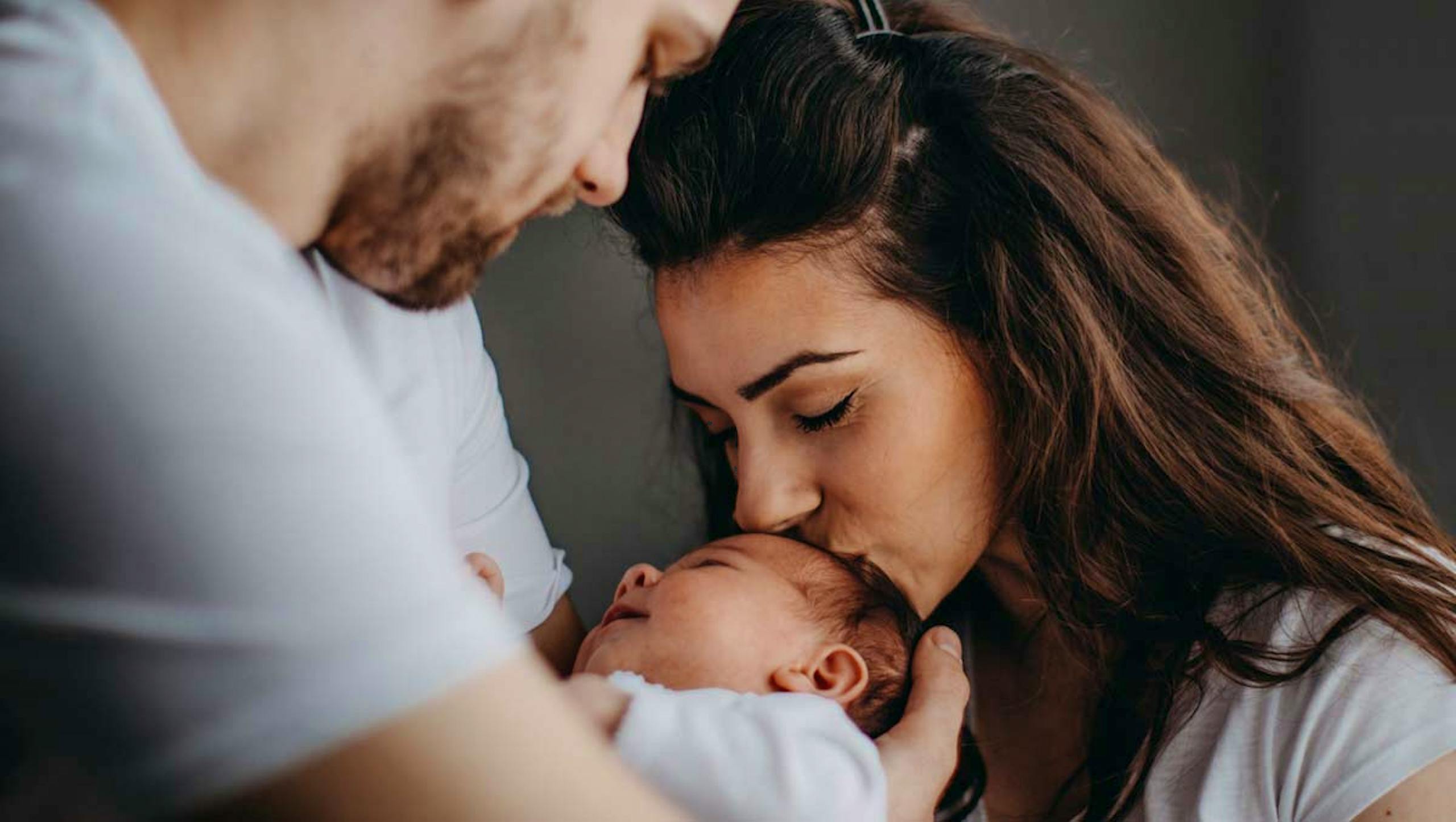 father, mother and baby