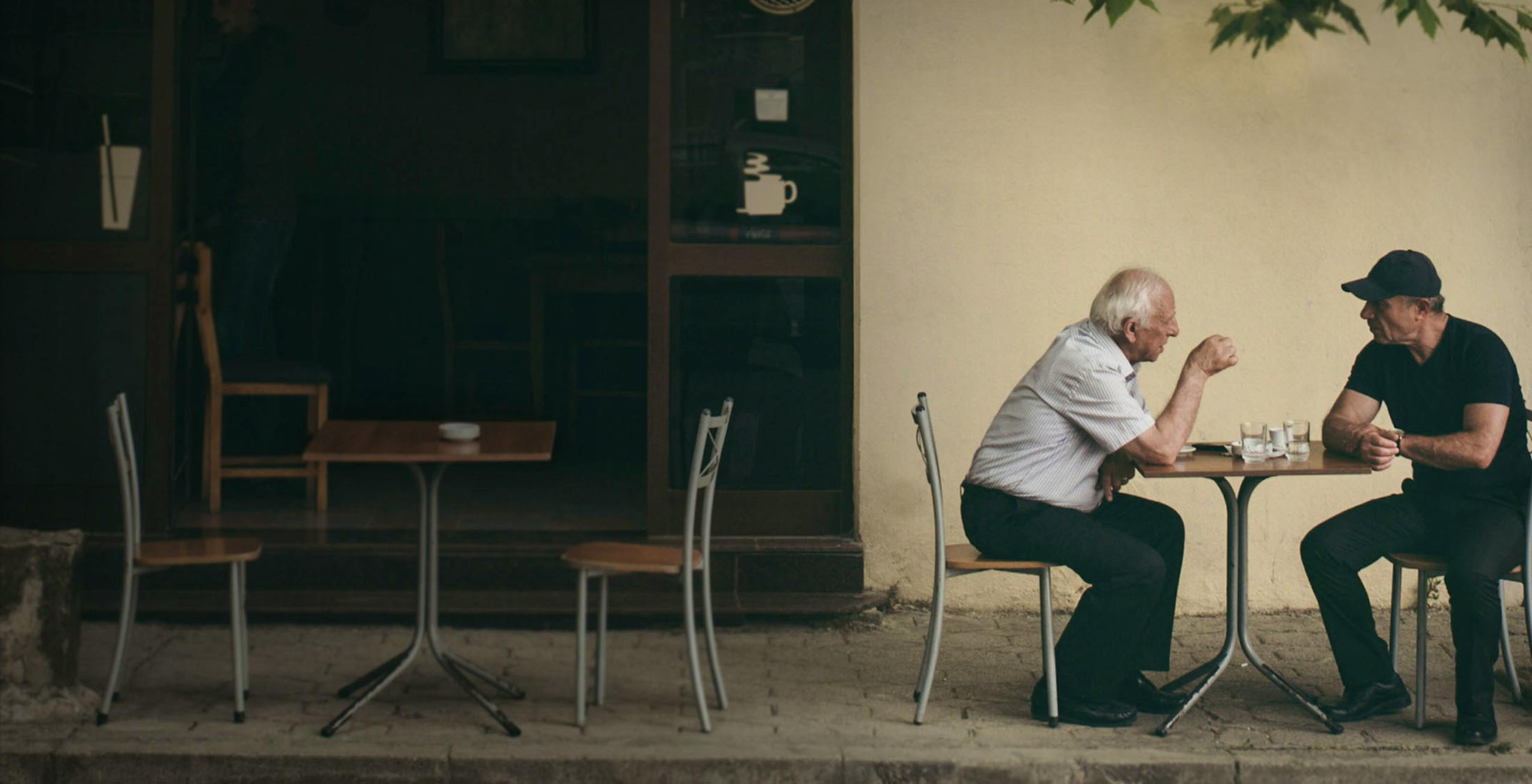 Two men talking