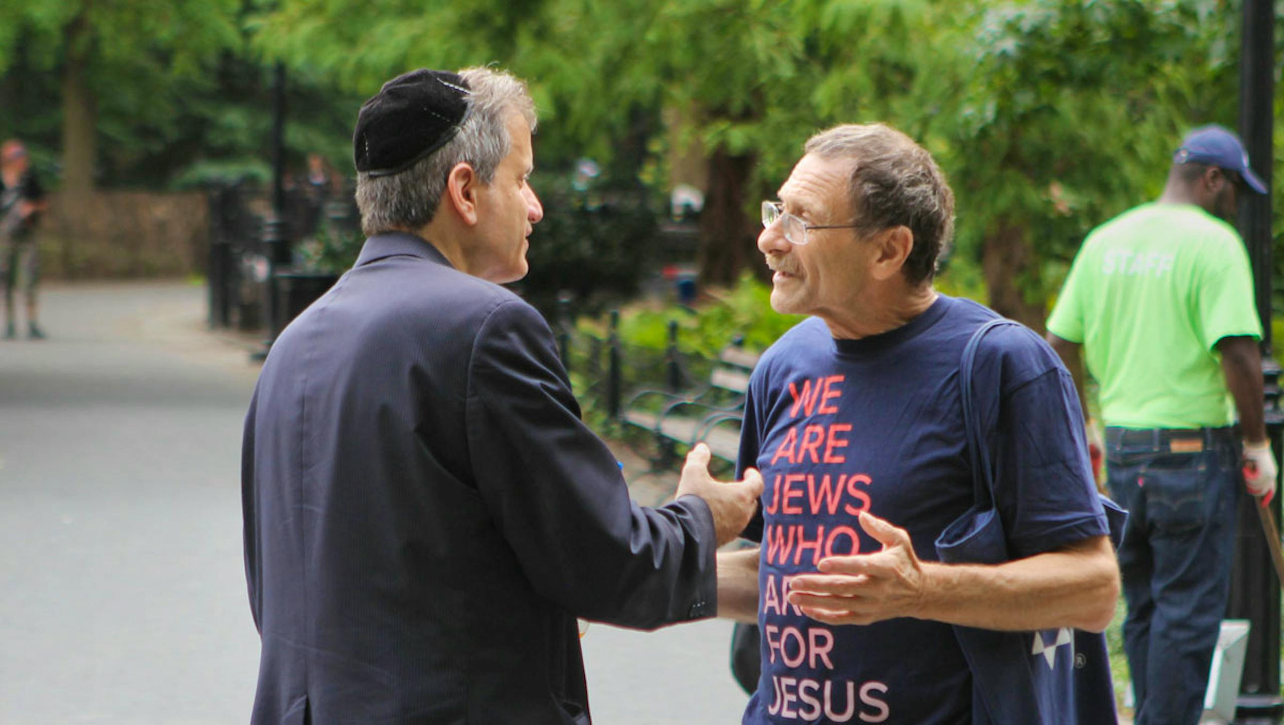 Jews for Jesus staff talking with another Jewish man