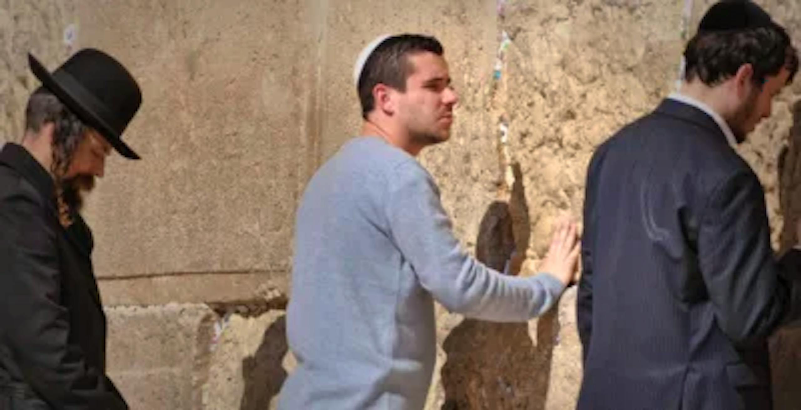 men at the wailing wall